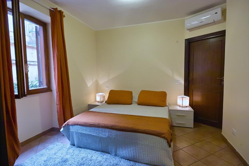Апартаменты Cortile House Рим Номер фото